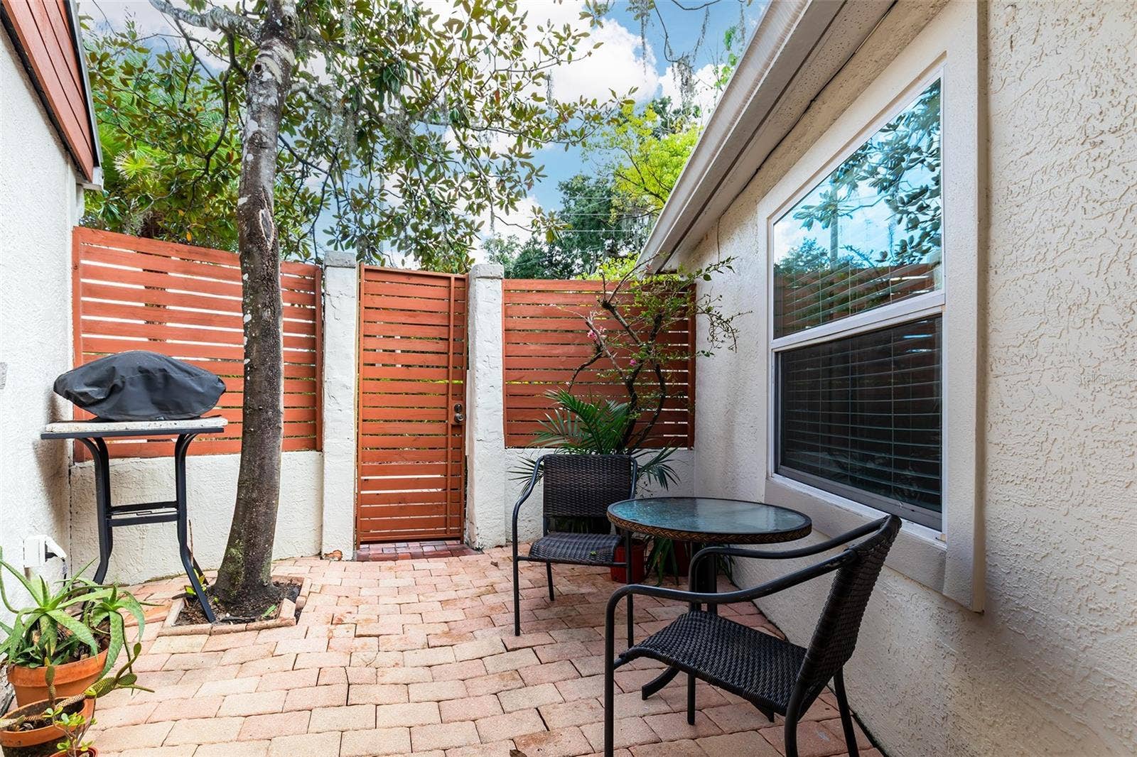 1036 DELANEY AVENUE, Orlando, FL 32806 Private courtyard right outside the In-Law Quarter