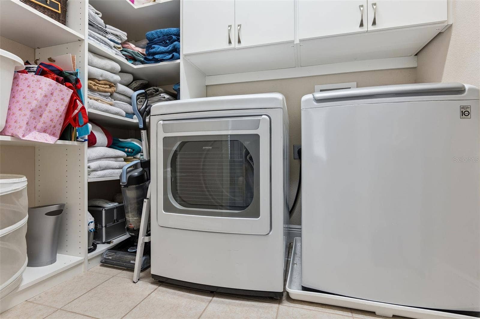 900 LOBELIA DRIVE, Lake Mary, FL 32746 Third floor laundry room with added storage