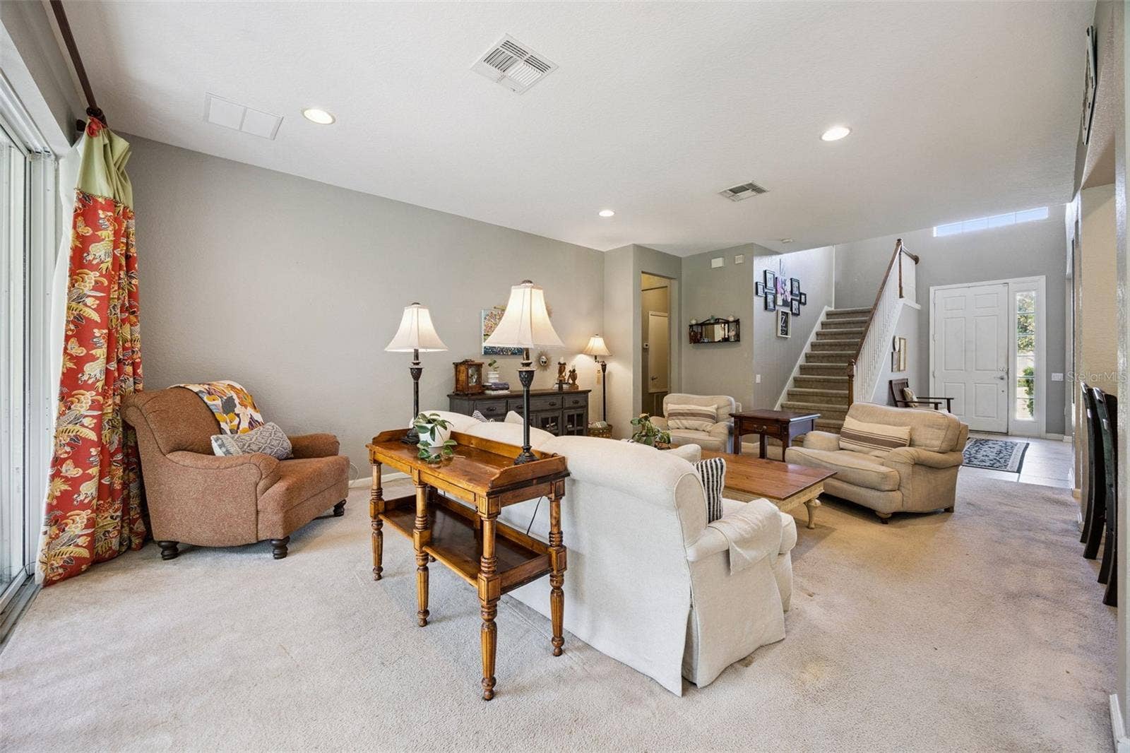 1140 TOLUKE POINT, Orlando, FL 32828 Family room off of kitchen with outdoor access