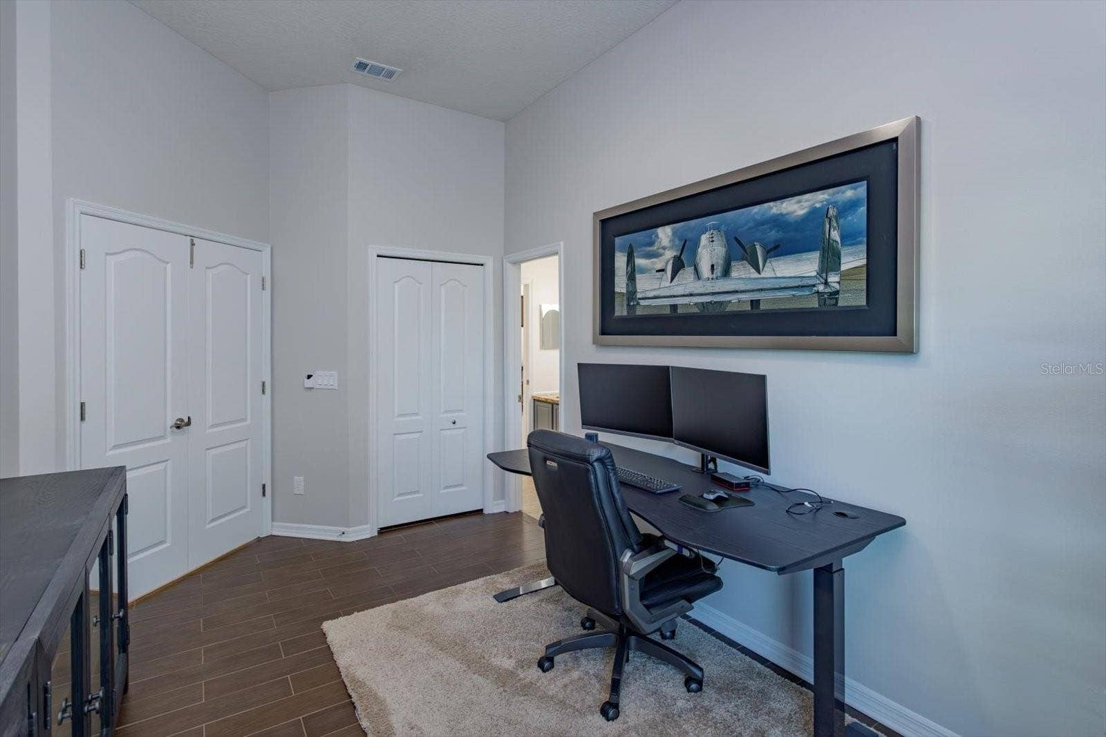 6887 HIDDEN GLADE PLACE, Sanford, FL 32771 Bedroom 4 with double doors is a great office or bedroom with attached bathroom