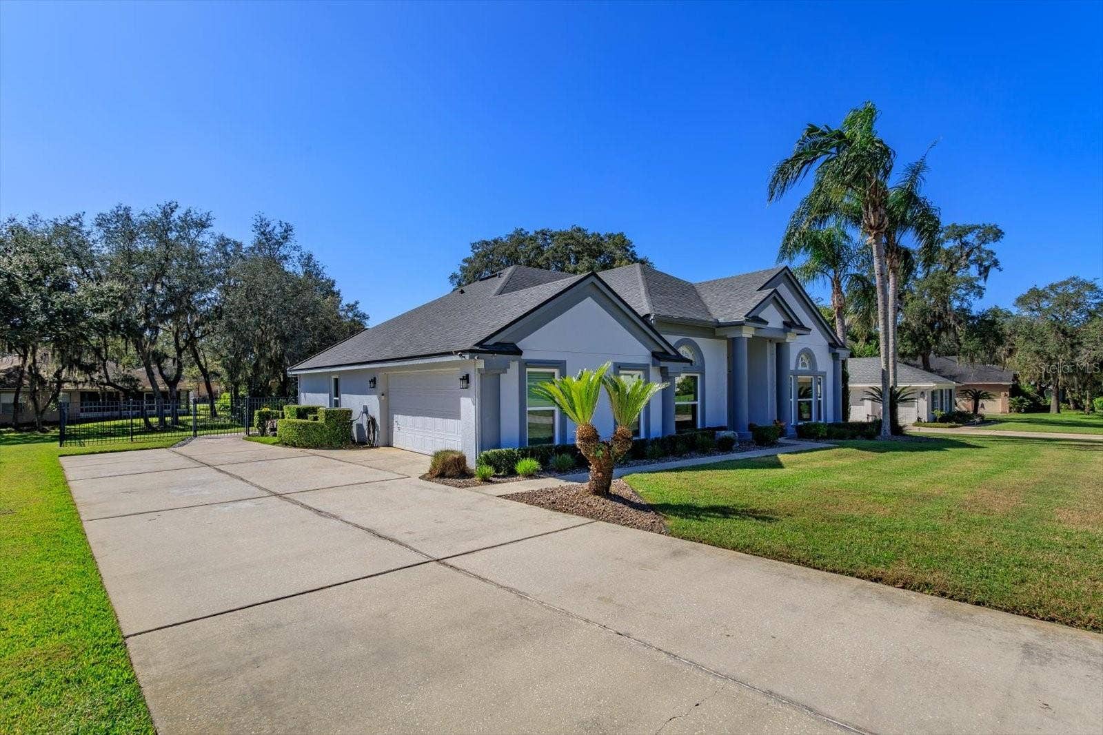 6887 HIDDEN GLADE PLACE, Sanford, FL 32771 Side entry garage with long driveway for lots of extra parking