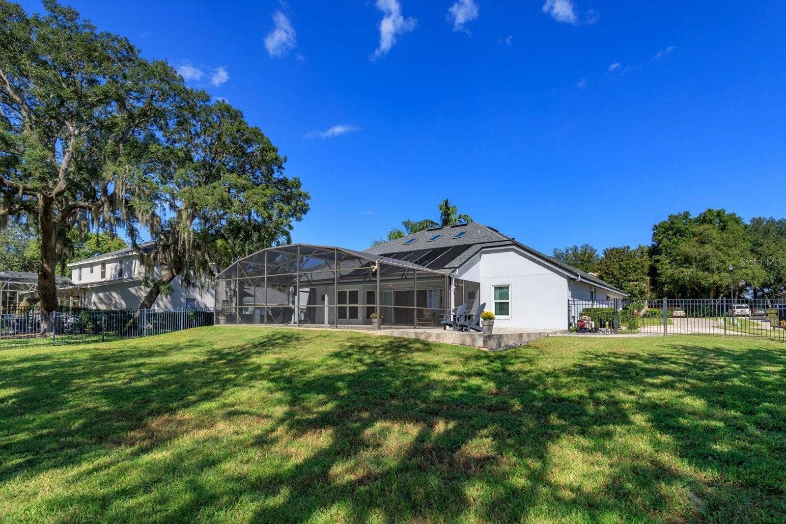6887 HIDDEN GLADE PLACE, Sanford, FL 32771 Lot size is 105' x 150' with aluminum fenced backyard