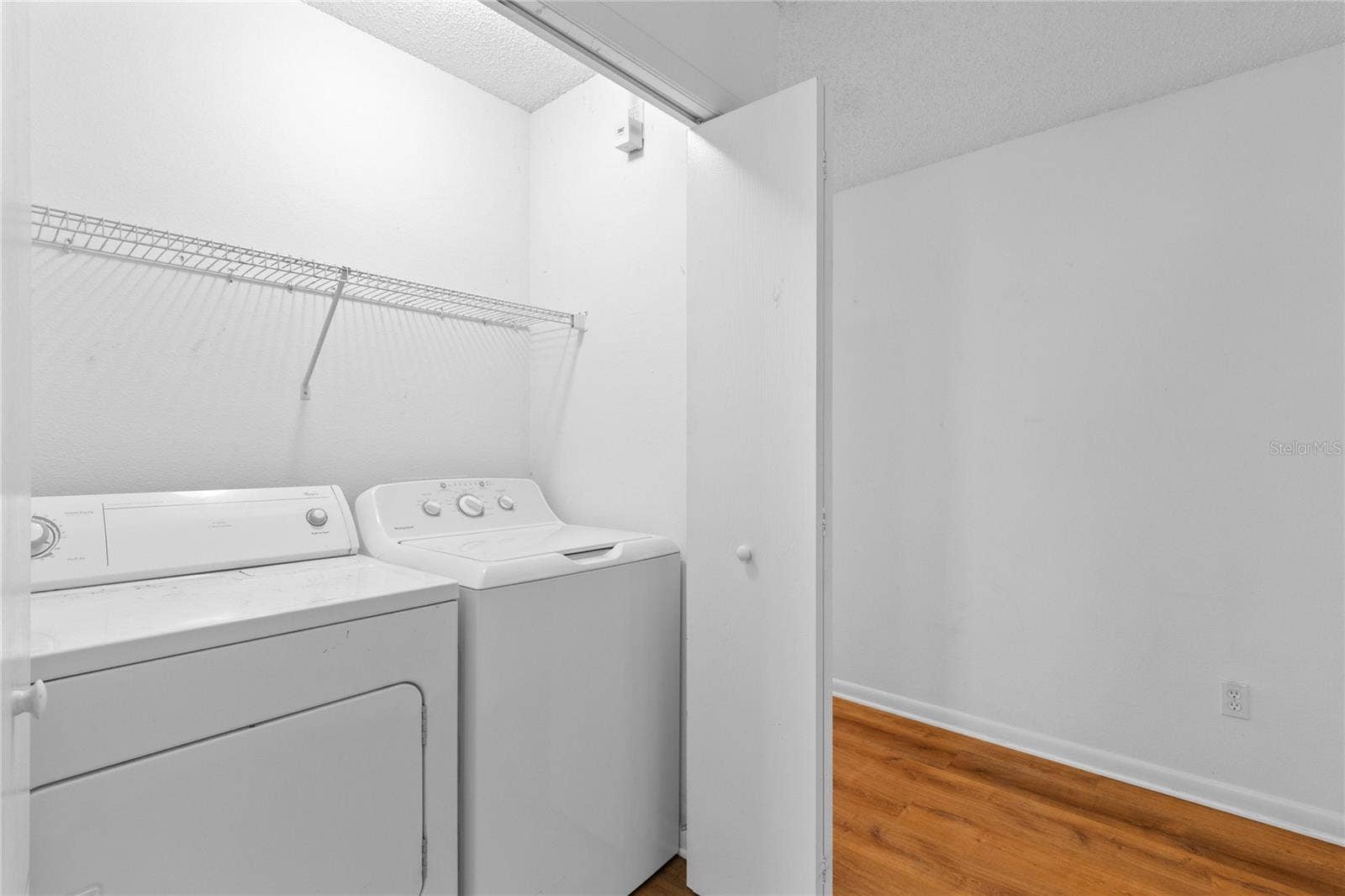12916 LEXINGTON SUMMIT STREET, Orlando, FL 32828 Laundry Area on 2nd floor