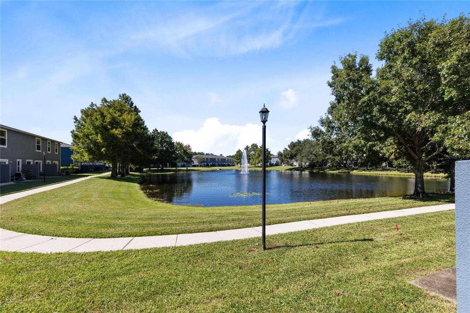 12916 LEXINGTON SUMMIT STREET, Orlando, FL 32828 Pond View