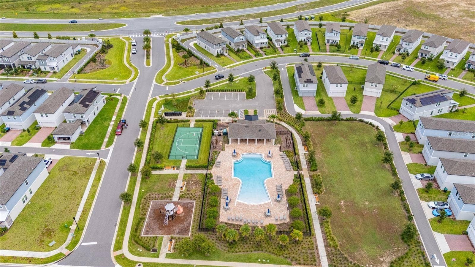 14026 FRASIER STREET, Winter Garden, FL 34787 Community amenities surrounded by neighborhood homes