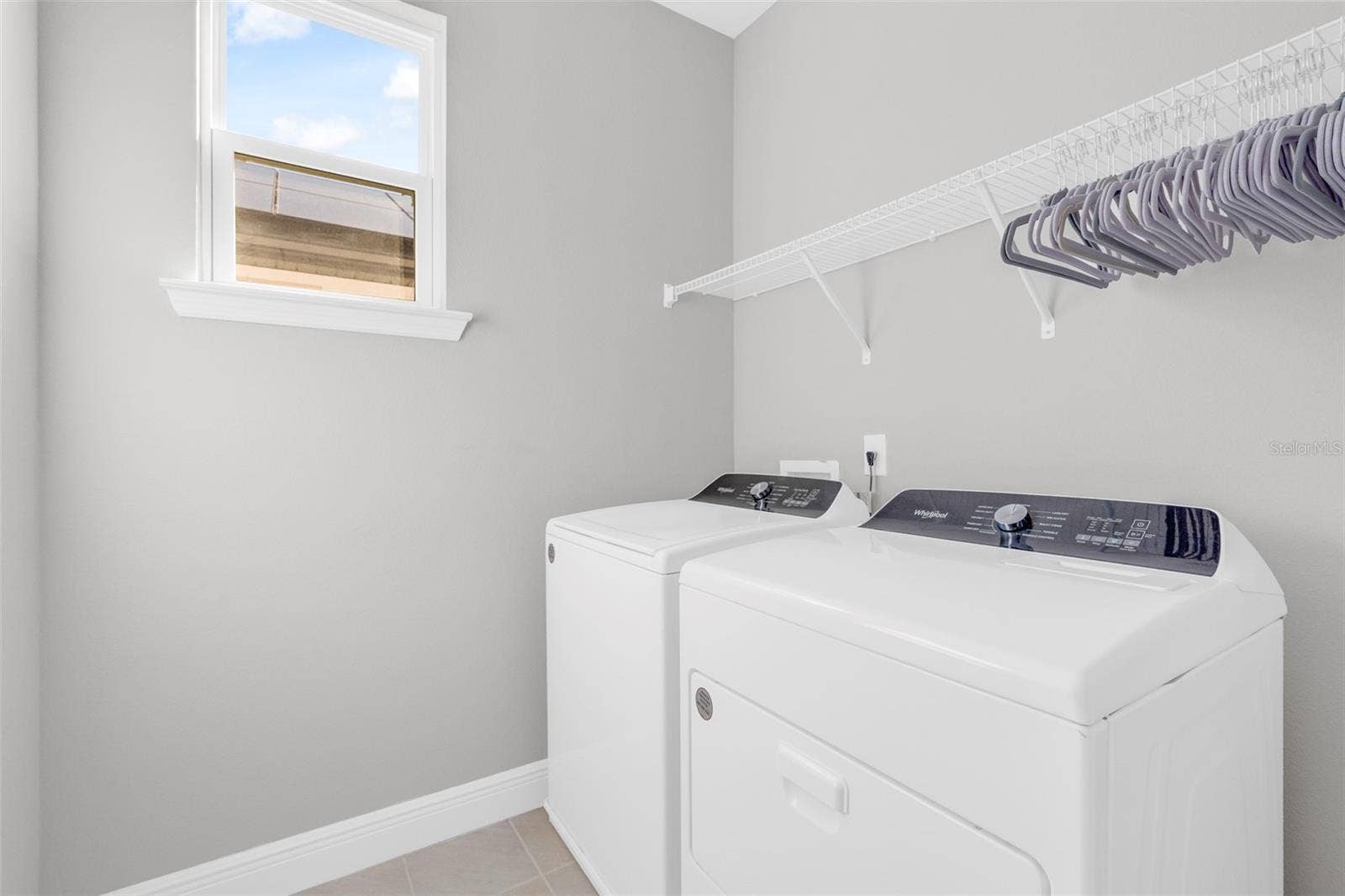 14026 FRASIER STREET, Winter Garden, FL 34787 Laundry room with washer and dryer