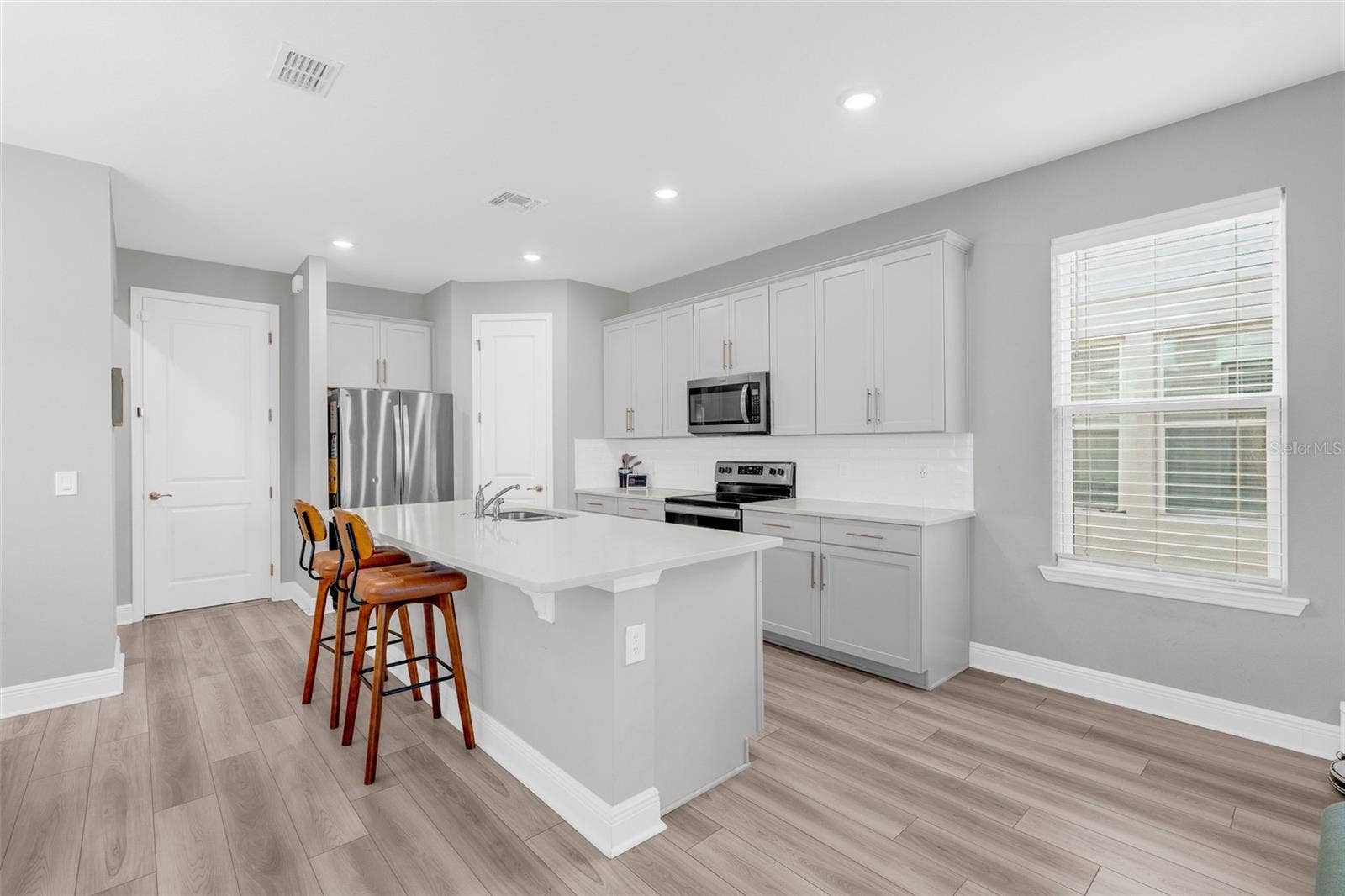 14026 FRASIER STREET, Winter Garden, FL 34787 Open kitchen overlooking the main living area