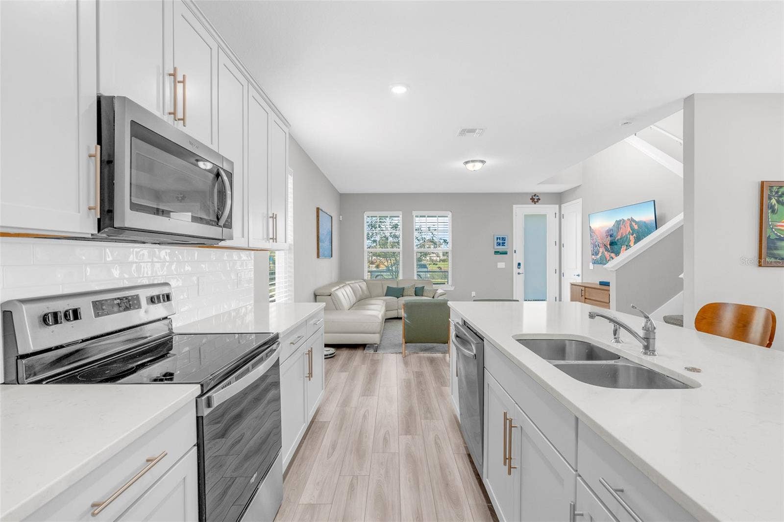 14026 FRASIER STREET, Winter Garden, FL 34787 Kitchen with stainless steel appliances and ample cabinetry