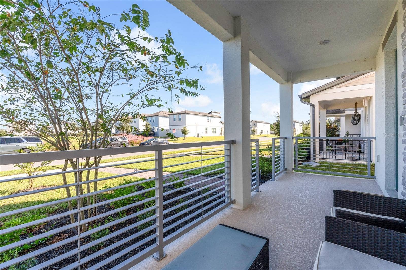 14026 FRASIER STREET, Winter Garden, FL 34787 Covered front porch overlooking the neighborhood