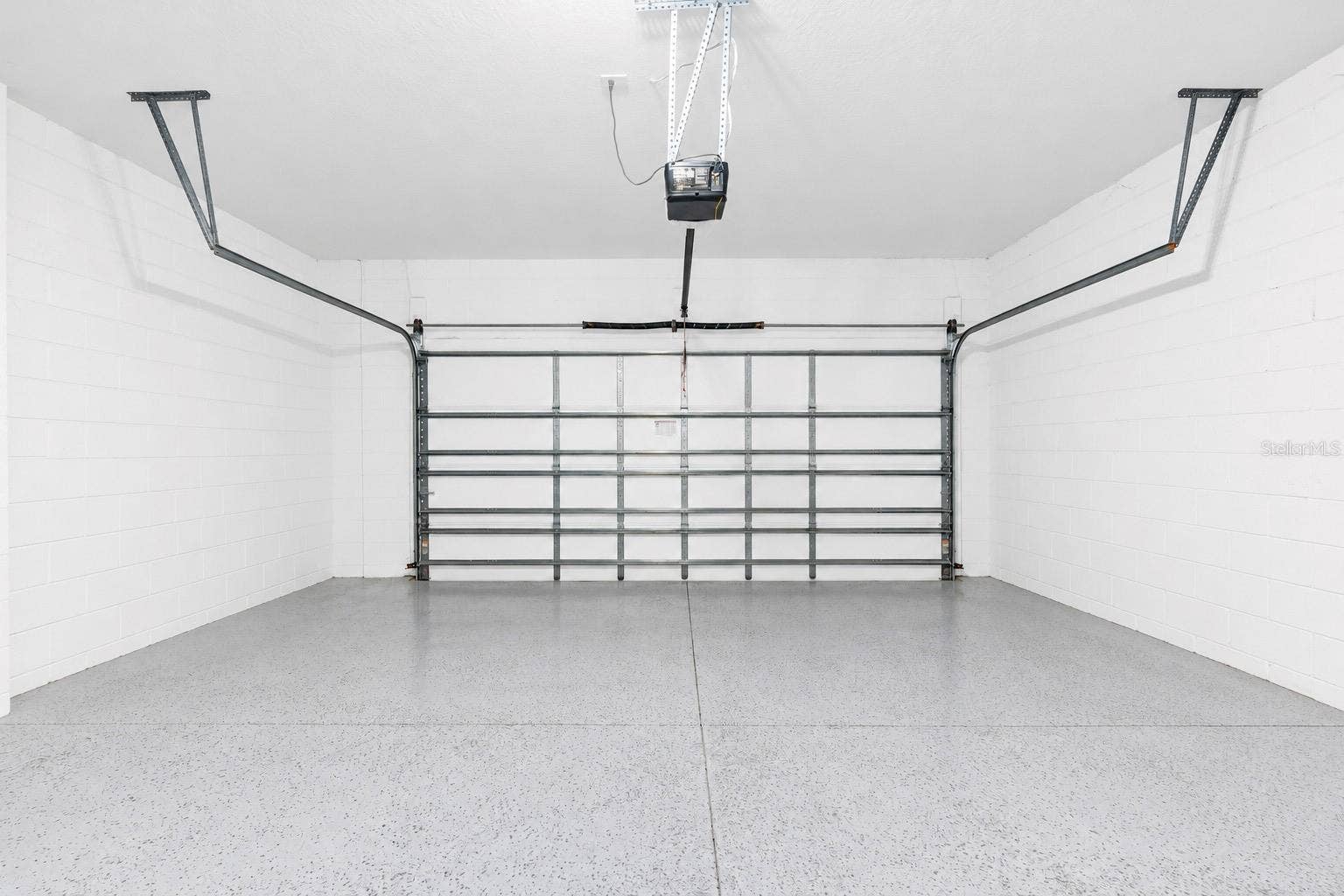 14026 FRASIER STREET, Winter Garden, FL 34787 Interior view of the two-car garage.