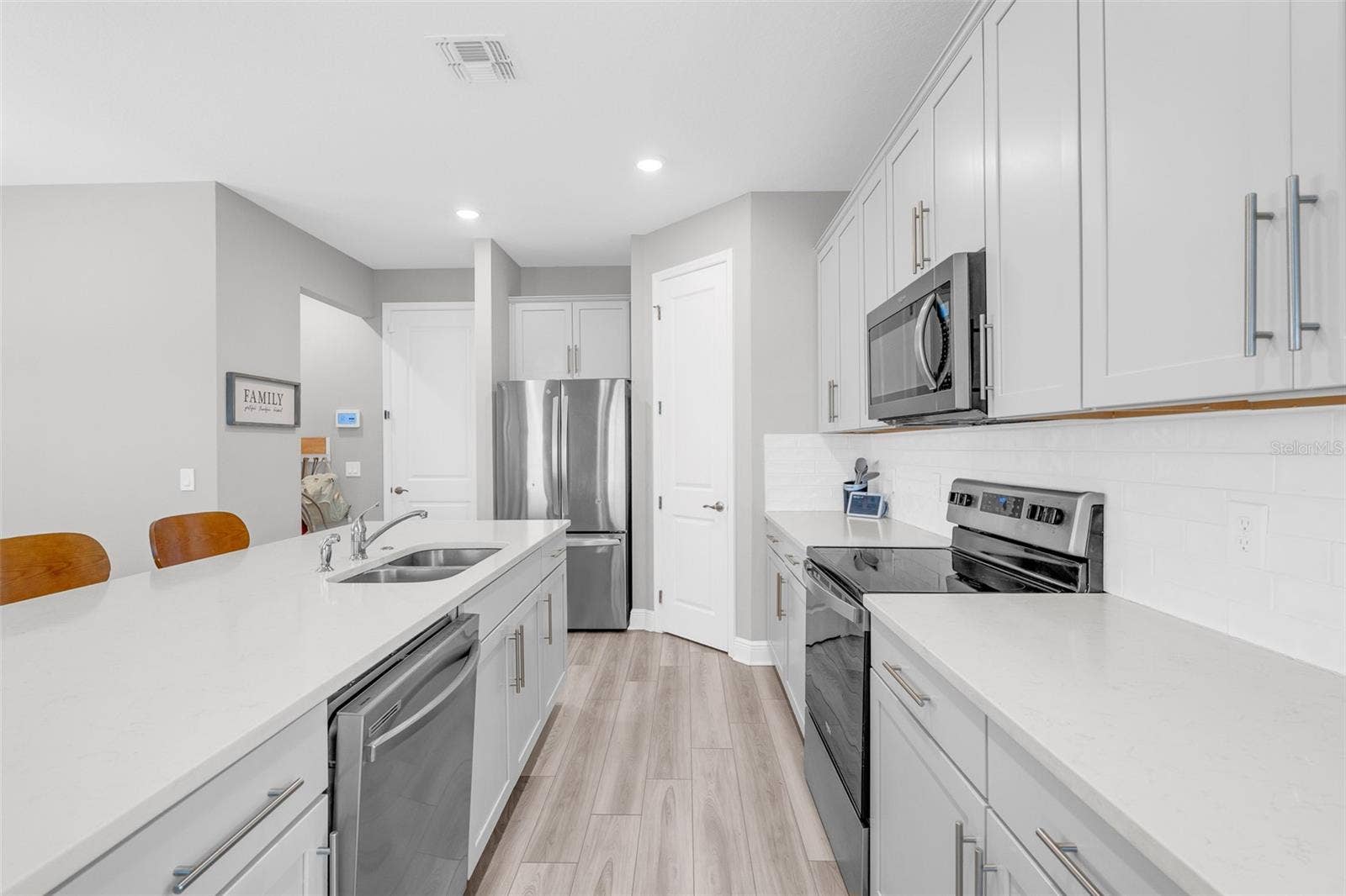 14026 FRASIER STREET, Winter Garden, FL 34787 Kitchen with generous counter space and cabinet storage