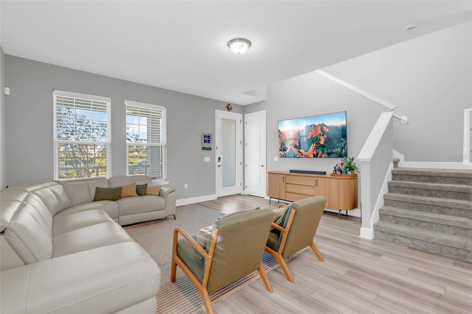 14026 FRASIER STREET, Winter Garden, FL 34787 Open living area with staircase to the second floor
