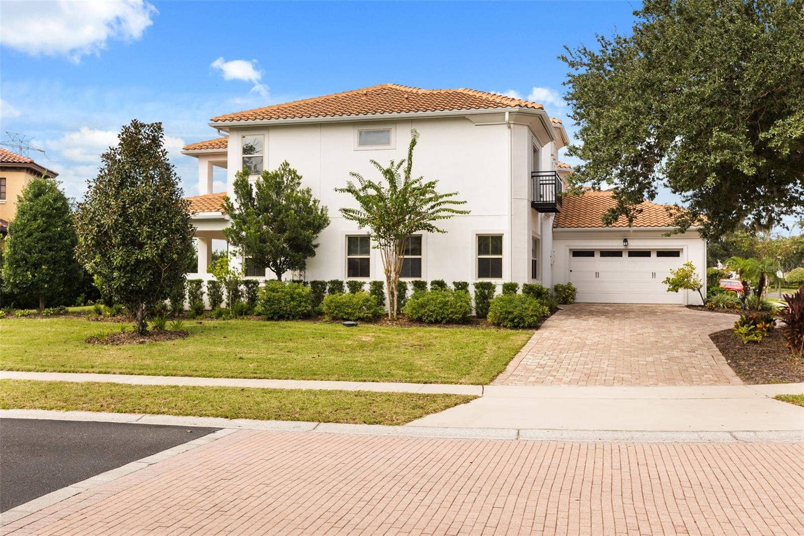 5508 EMERSON POINTE WAY, Orlando, FL 32819 Side Garage View