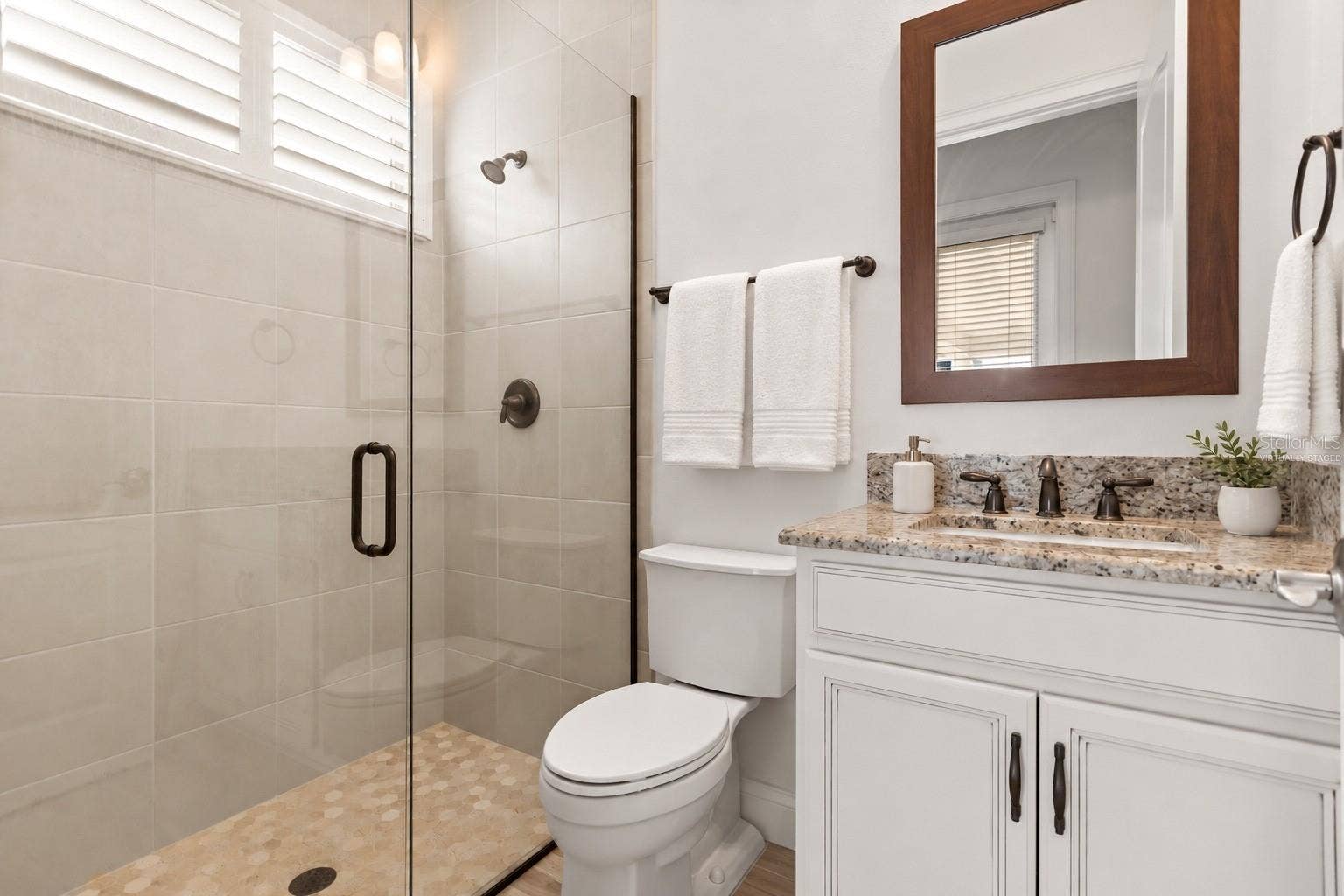 5508 EMERSON POINTE WAY, Orlando, FL 32819 Virtually Staged First Floor Bath