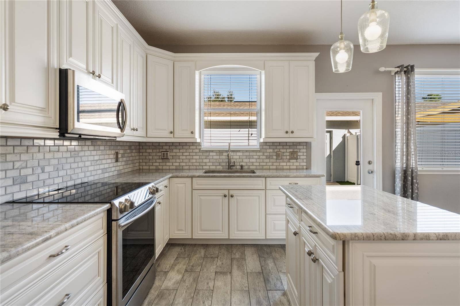 8516 DANFORTH DRIVE, Windermere, FL 34786 Kitchen with stainless steel appliances included!