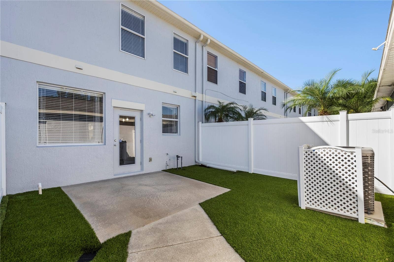 8516 DANFORTH DRIVE, Windermere, FL 34786 Courtyard Patio with artificial turf