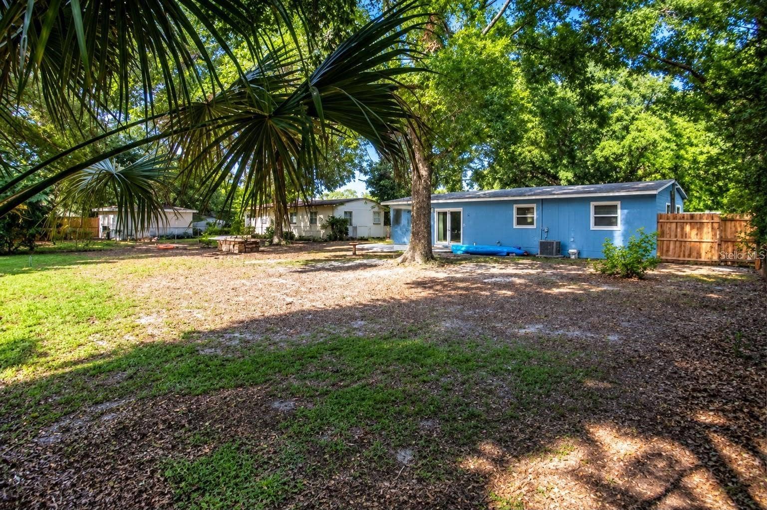 800 DORADO AVENUE, Orlando, FL 32807 Enjoy your own backyard retreat with lush greenery, natural shade, and outdoor space to make your own.