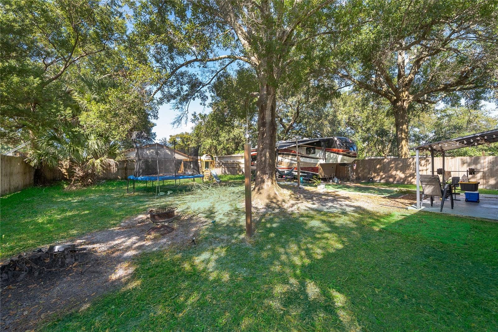 800 DORADO AVENUE, Orlando, FL 32807 Imagine weekend gatherings, outdoor activities, or simply relaxing beneath the shade of the beautiful mature trees.