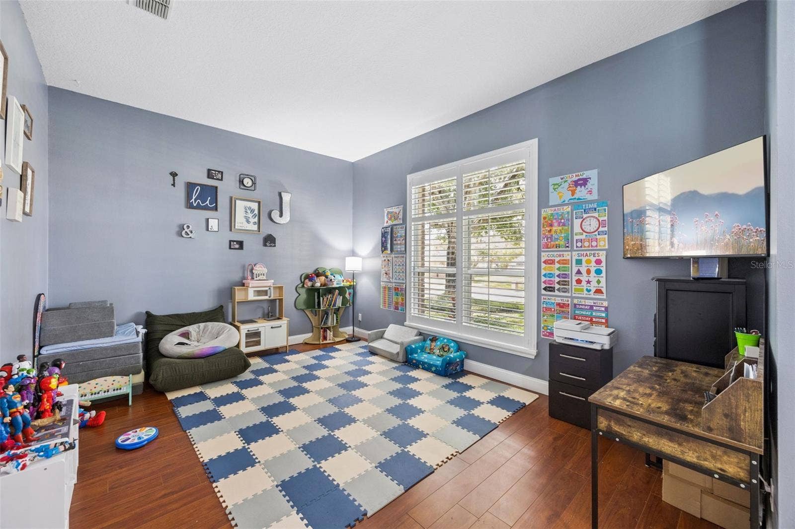 1505 Grassy Ridge Ln -front living space currently used as a playroom