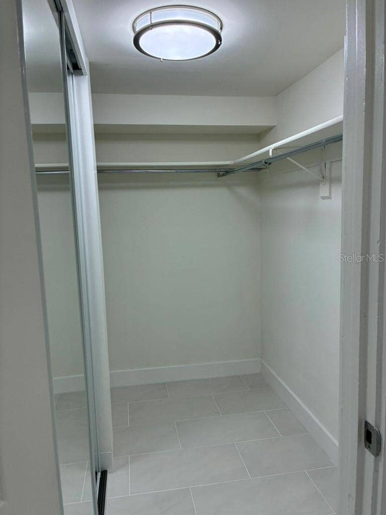 5999 VILLAGE CIRCLE, #990, Orlando, FL 32822 Master walk-in closet