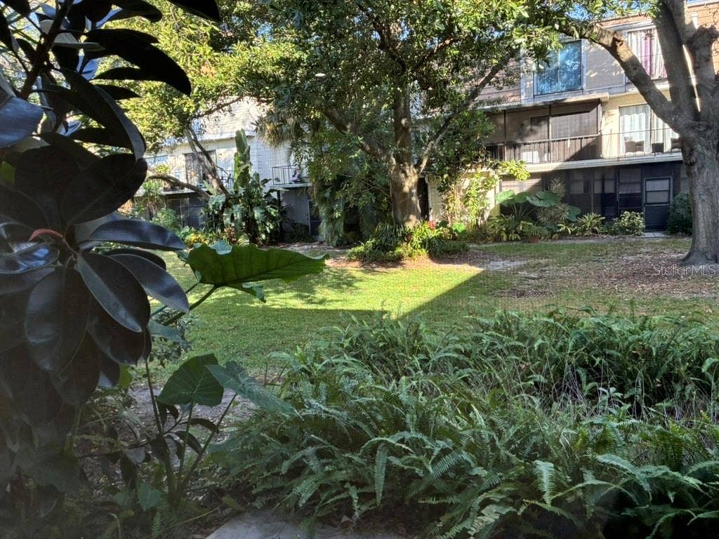 5999 VILLAGE CIRCLE, #990, Orlando, FL 32822 Garden as seen from rear porch