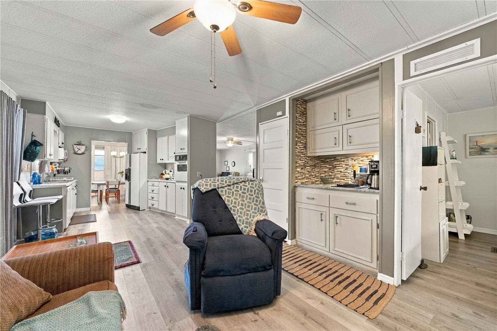 130 PINEY RIDGE, Eustis, FL 32726 Family Room into the Kitchen