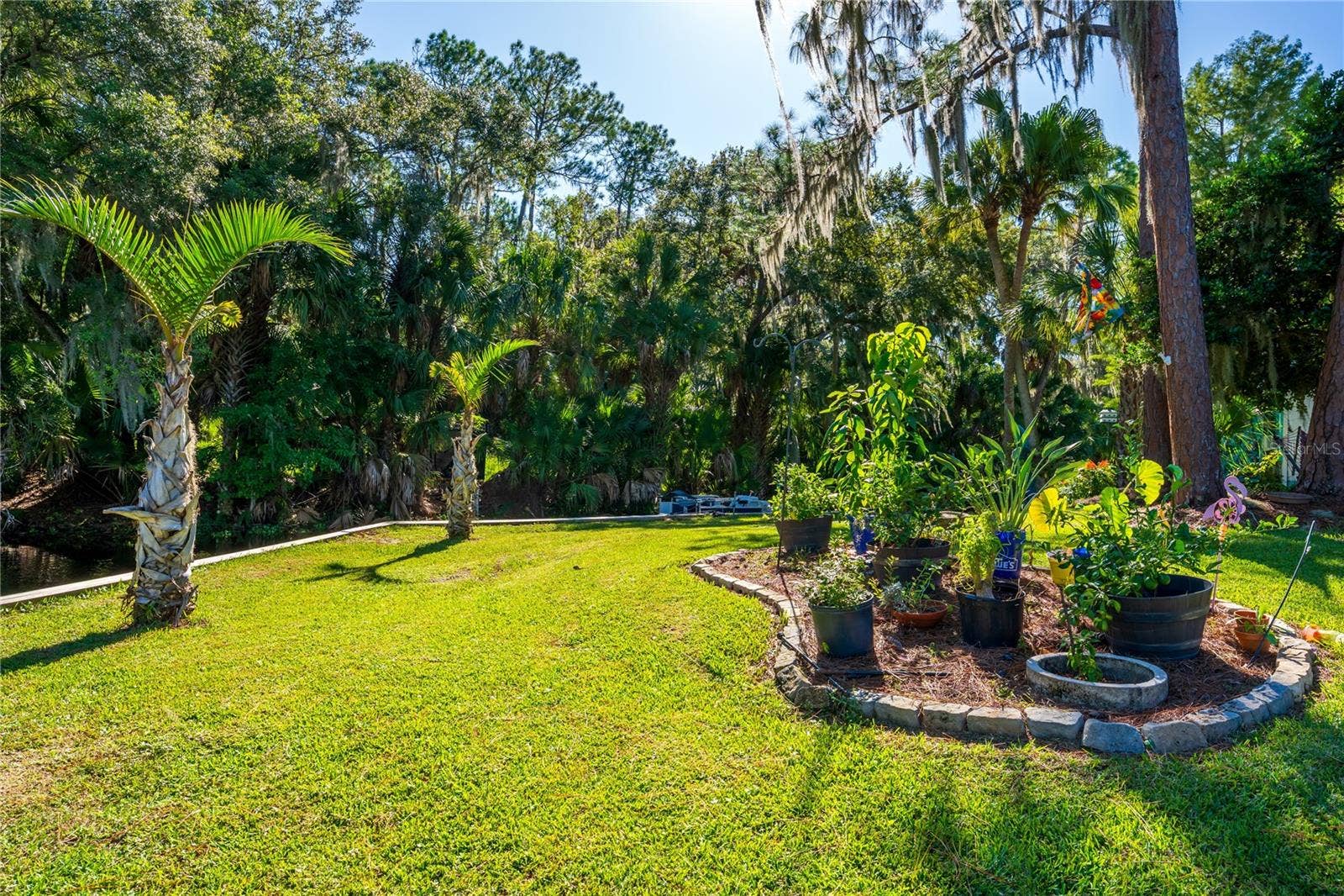 130 PINEY RIDGE, Eustis, FL 32726 Back Yard into the Canal
