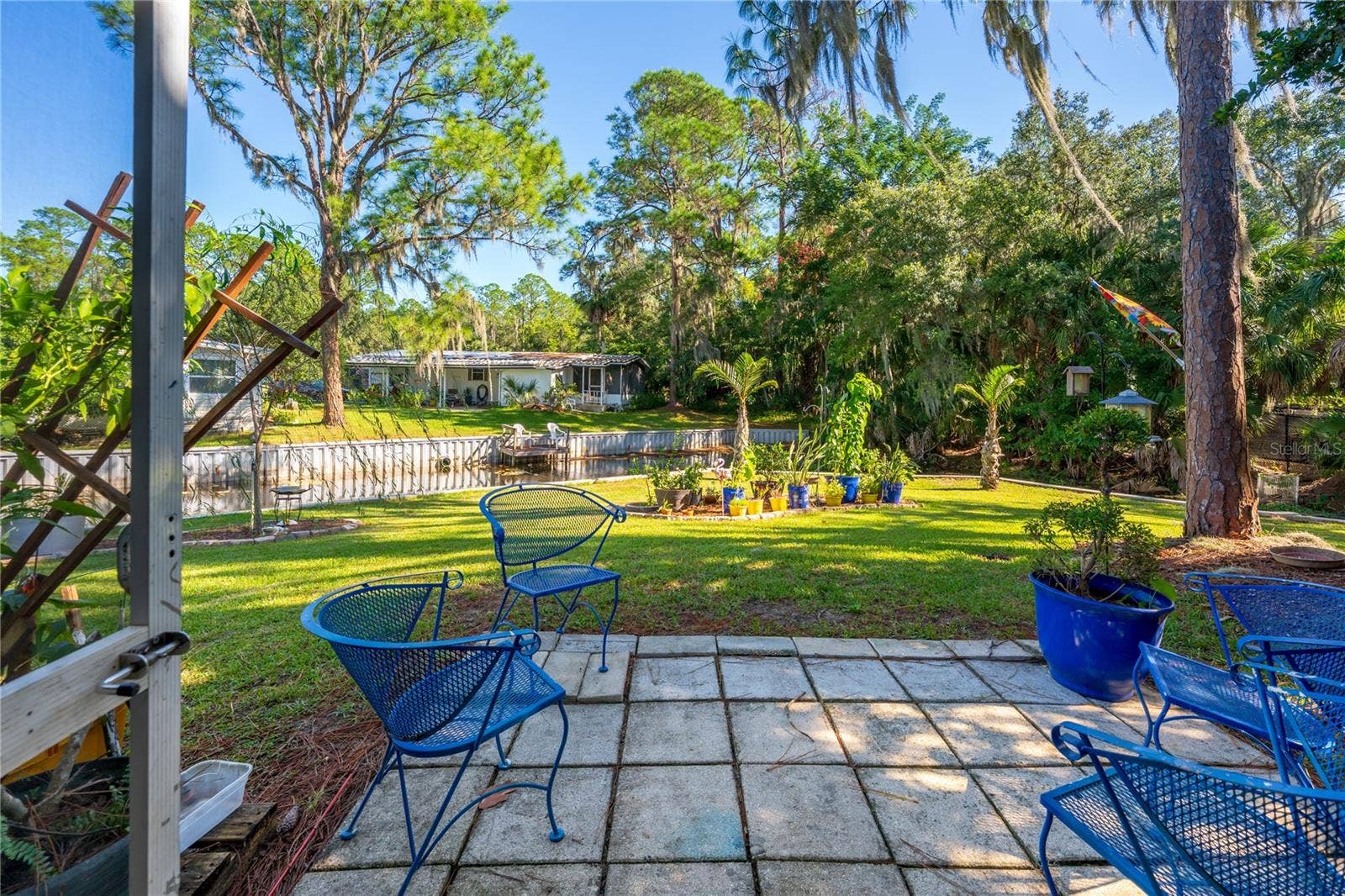 130 PINEY RIDGE, Eustis, FL 32726 Back View into the Canal