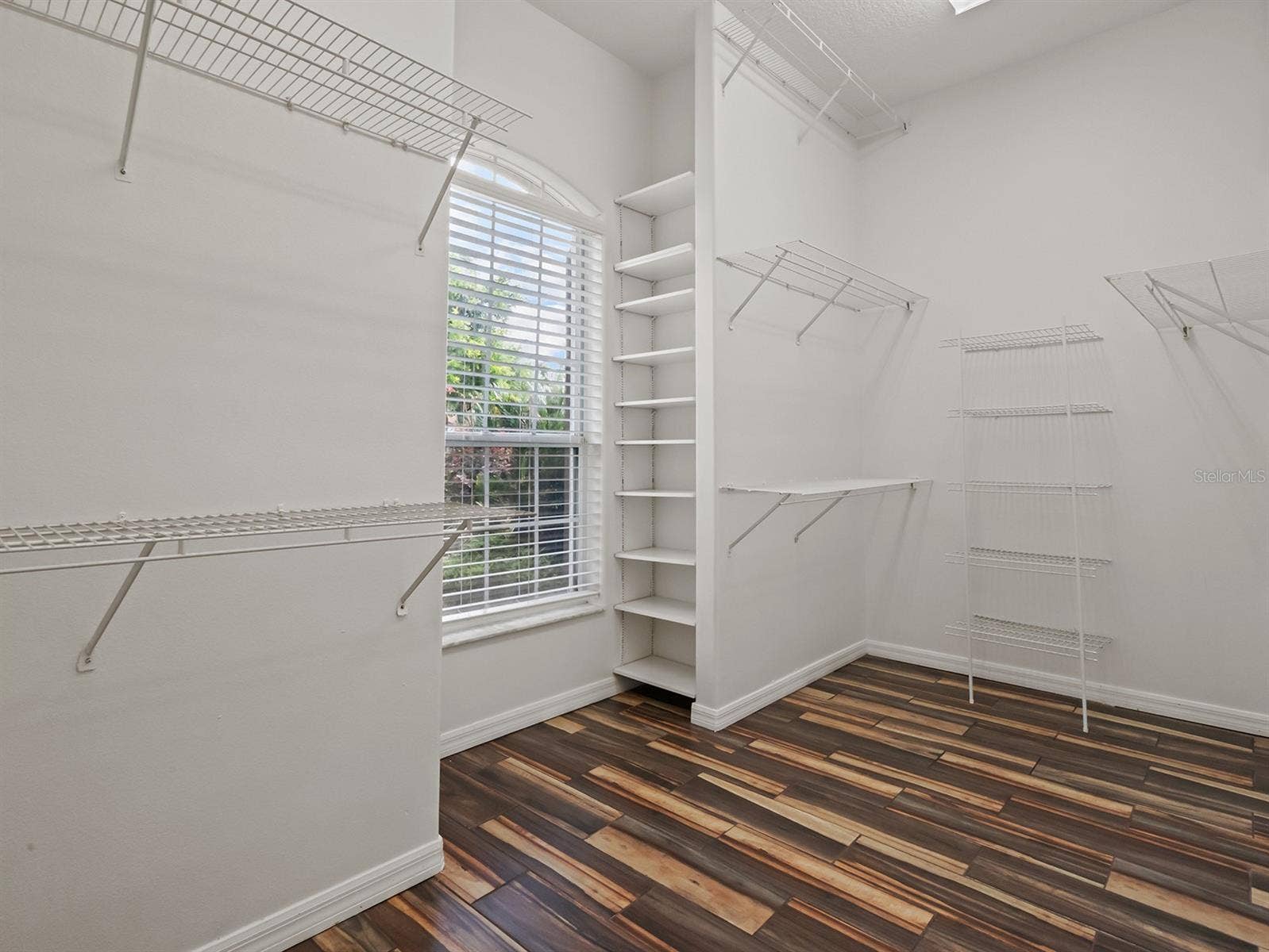 8359 GREY BARK COURT, Sanford, FL 32771 Large Master Closet 1 of 2