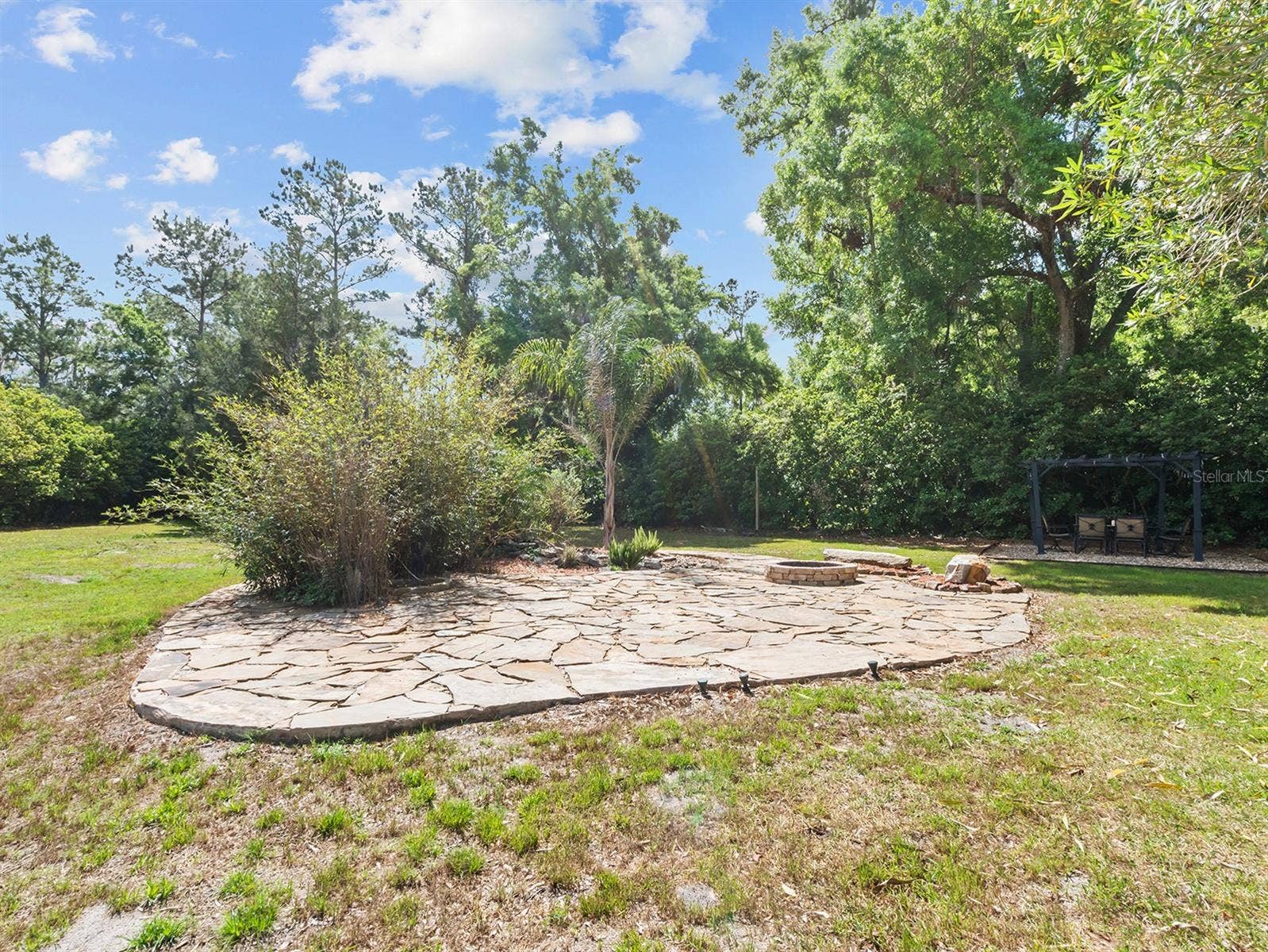 8359 GREY BARK COURT, Sanford, FL 32771 Backyard entertaining area