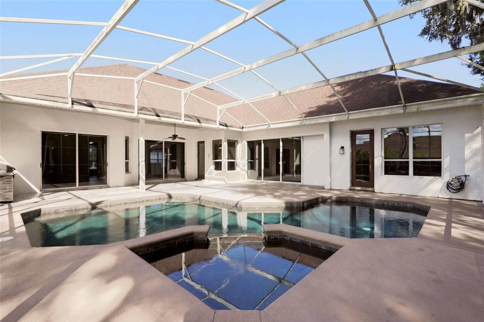 8359 GREY BARK COURT, Sanford, FL 32771 Pool with Sliding Glass Doors around