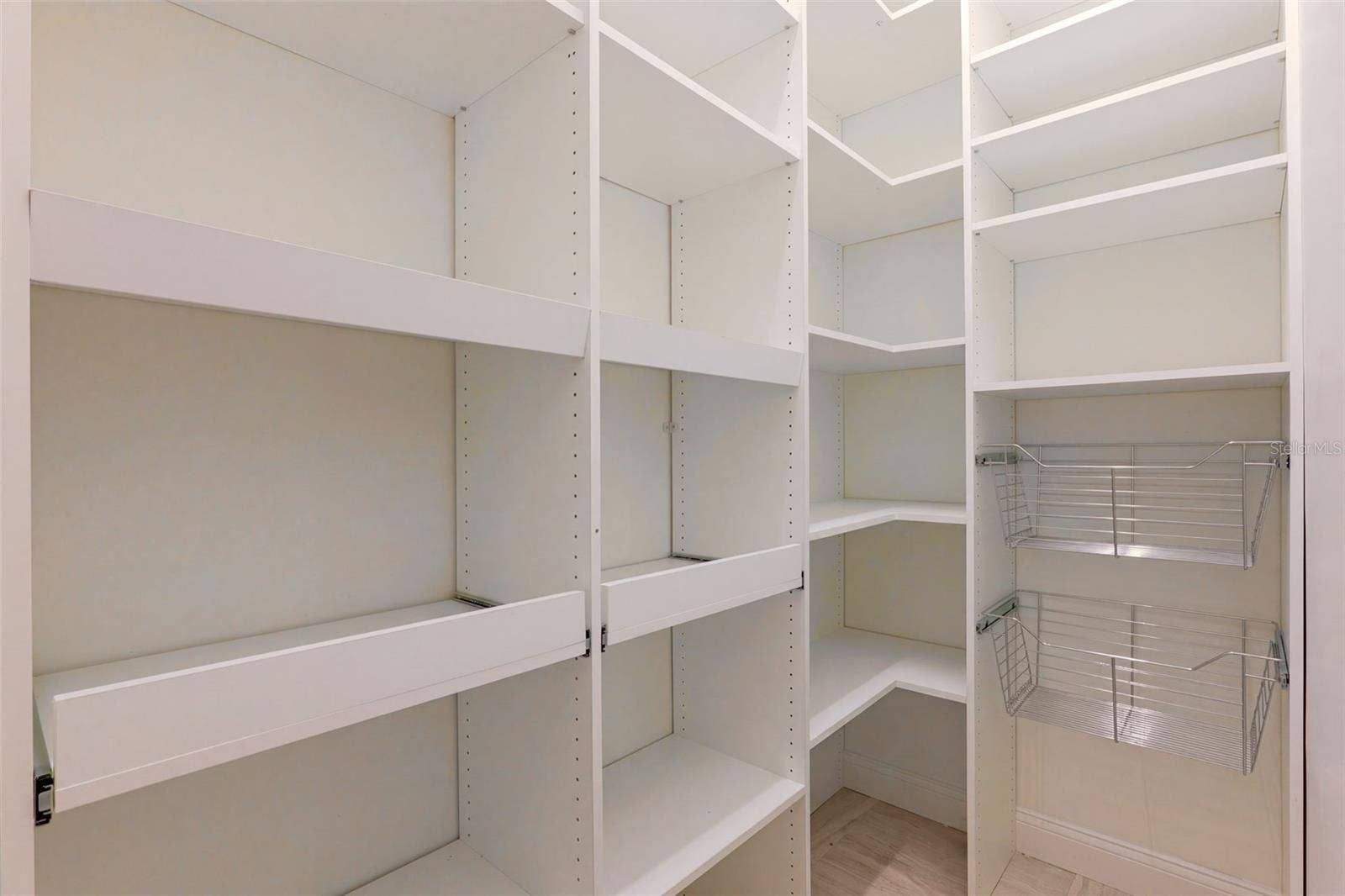 8359 GREY BARK COURT, Sanford, FL 32771 Large walk-in pantry with new shelving