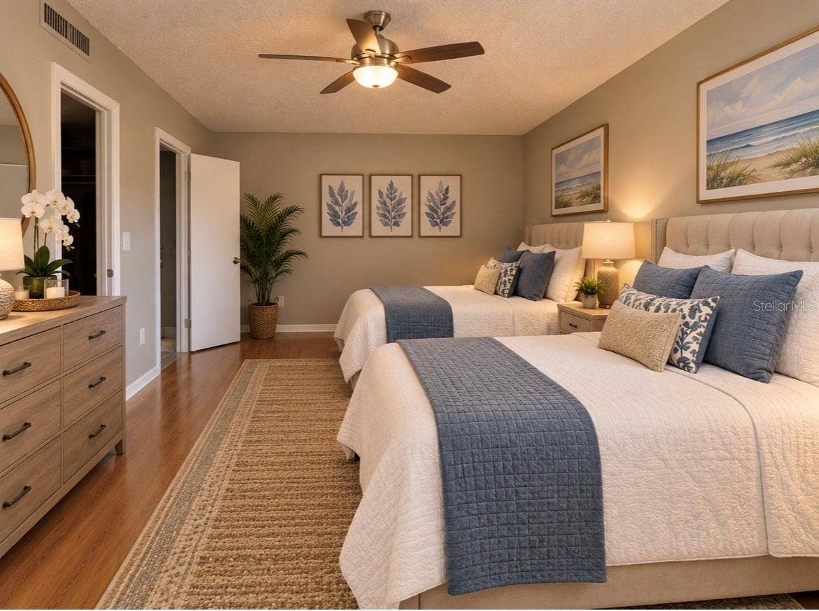 6073 AMBERLY TERRACE, #T13, Orlando, FL 32822 virtual staged bedroom