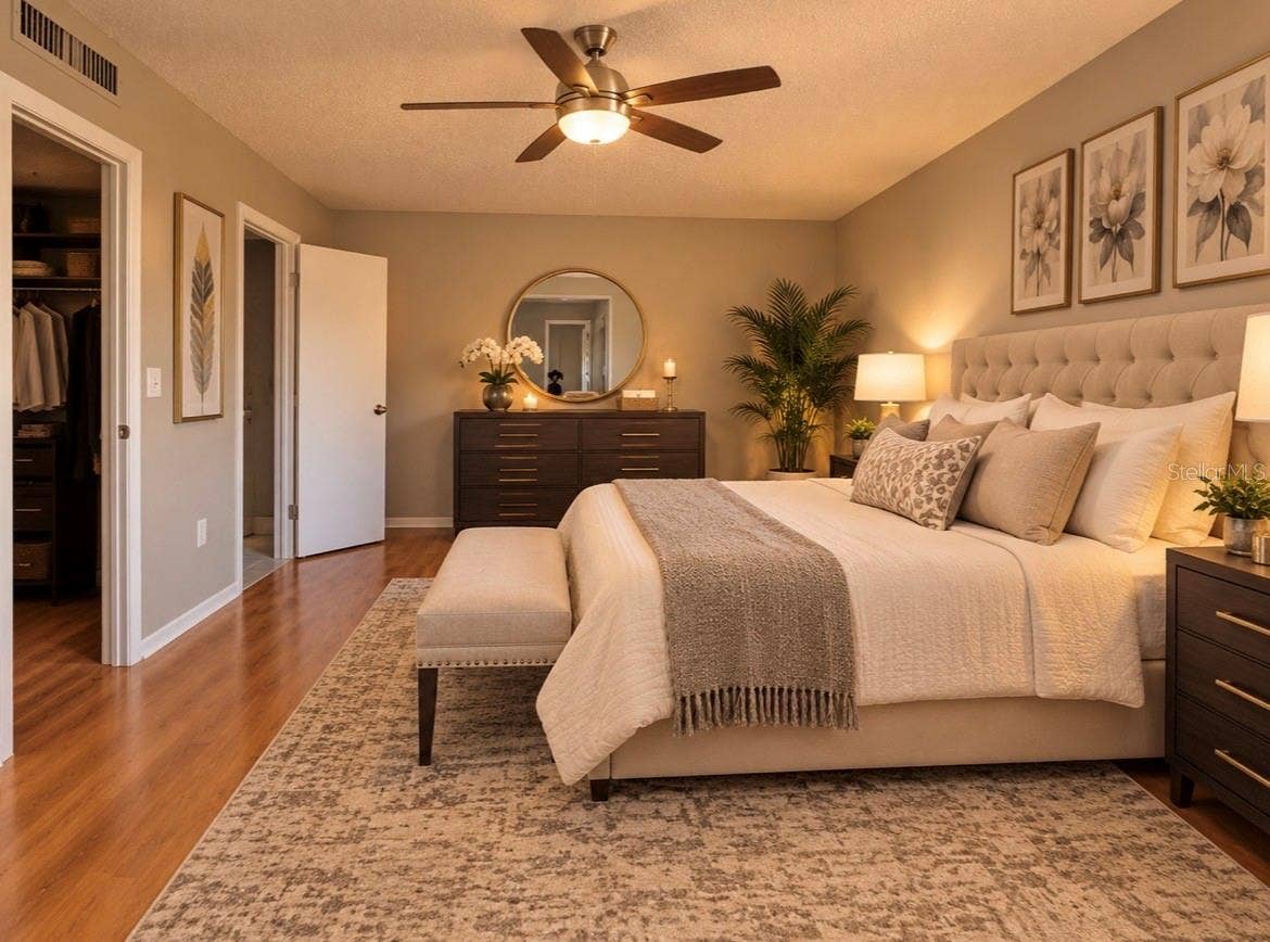 6073 AMBERLY TERRACE, #T13, Orlando, FL 32822 virtual staged master bedroom