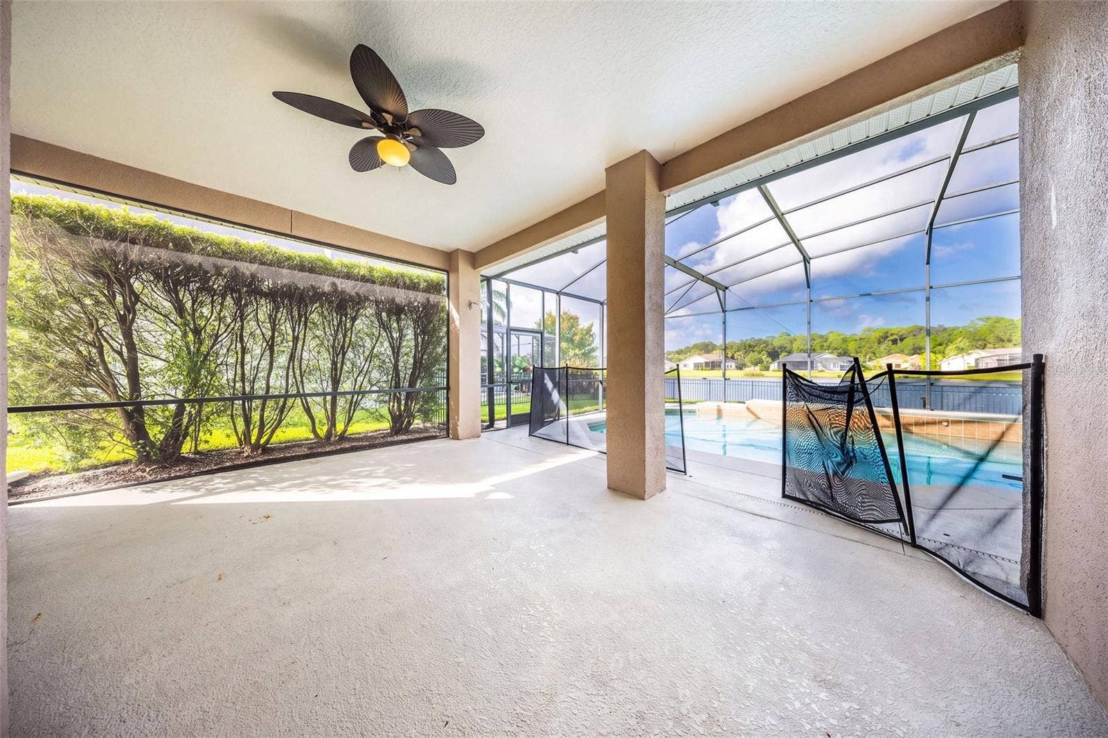 1726 ASTOR FARMS PLACE, Sanford, FL 32771 Large Covered Lanai, overlooking pool and water
