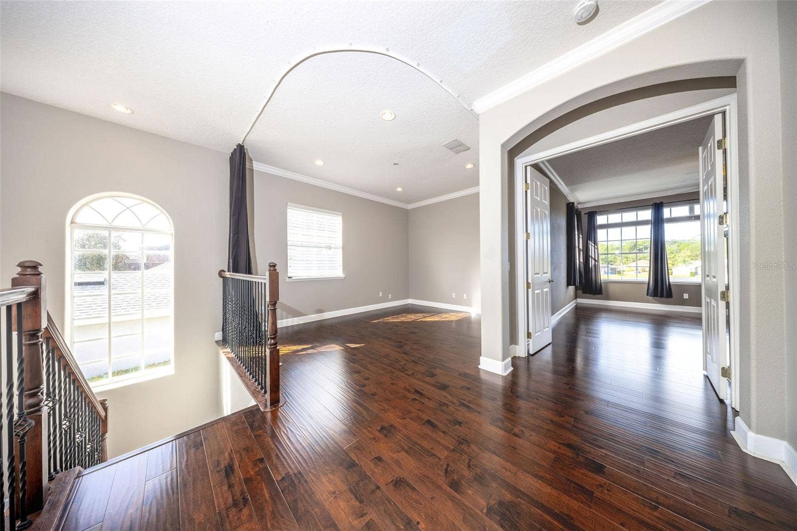 1726 ASTOR FARMS PLACE, Sanford, FL 32771 Loft space and primary bedroom entrance