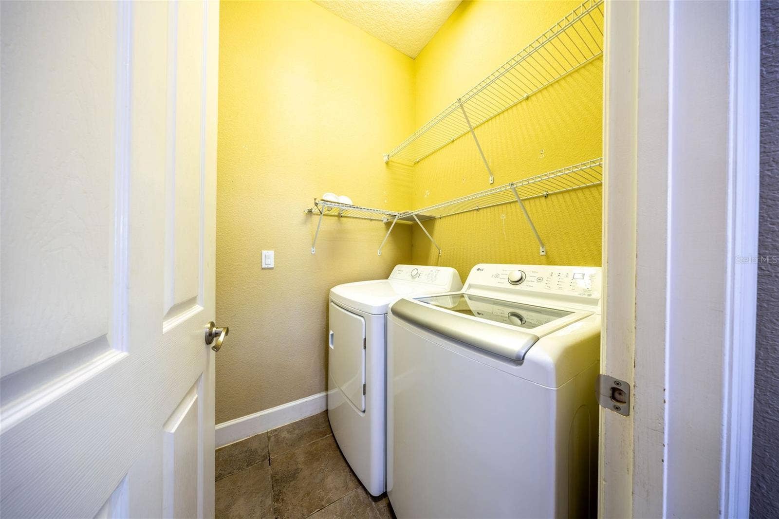 1726 ASTOR FARMS PLACE, Sanford, FL 32771 Downstairs laundry
