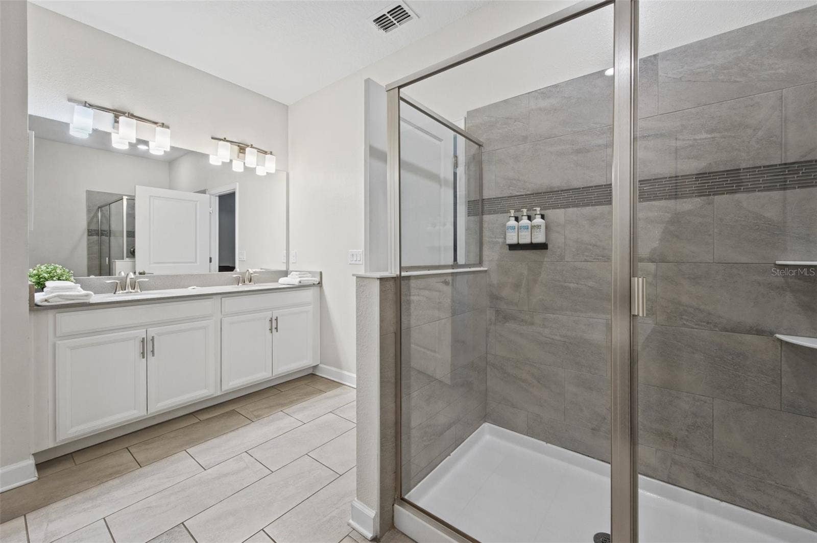 1540 MAIDSTONE COURT, Davenport, FL 33896 Double vanity and walk-in shower