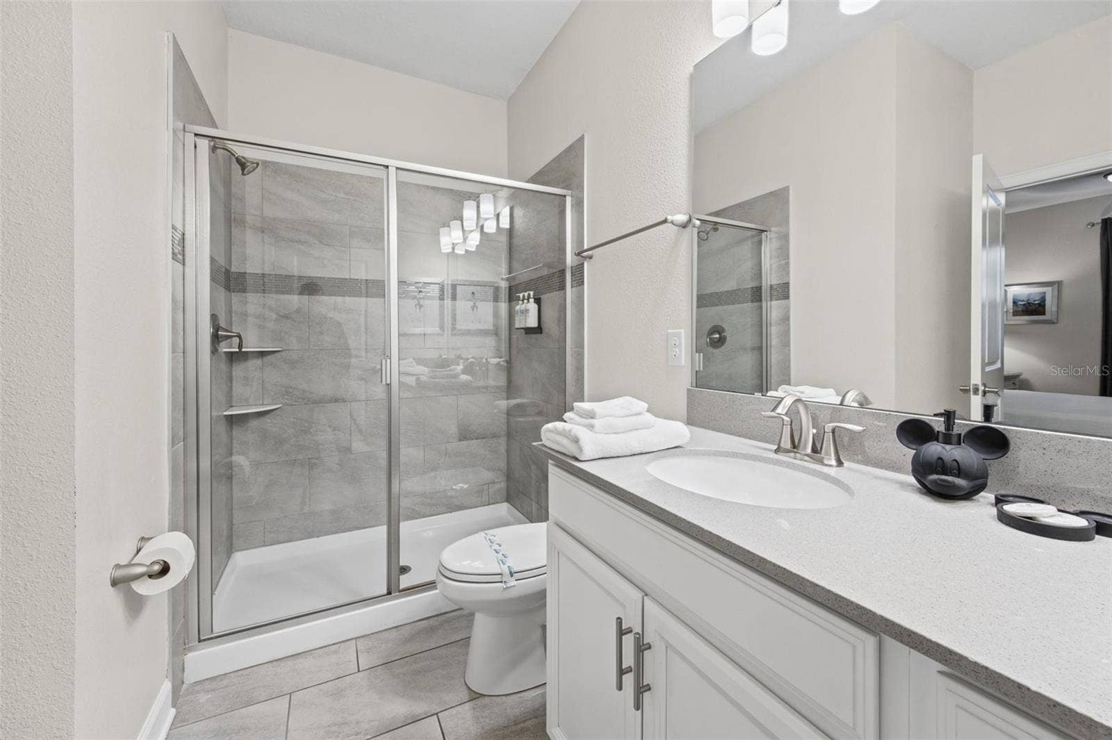1540 MAIDSTONE COURT, Davenport, FL 33896 Bathroom with walk-in shower
