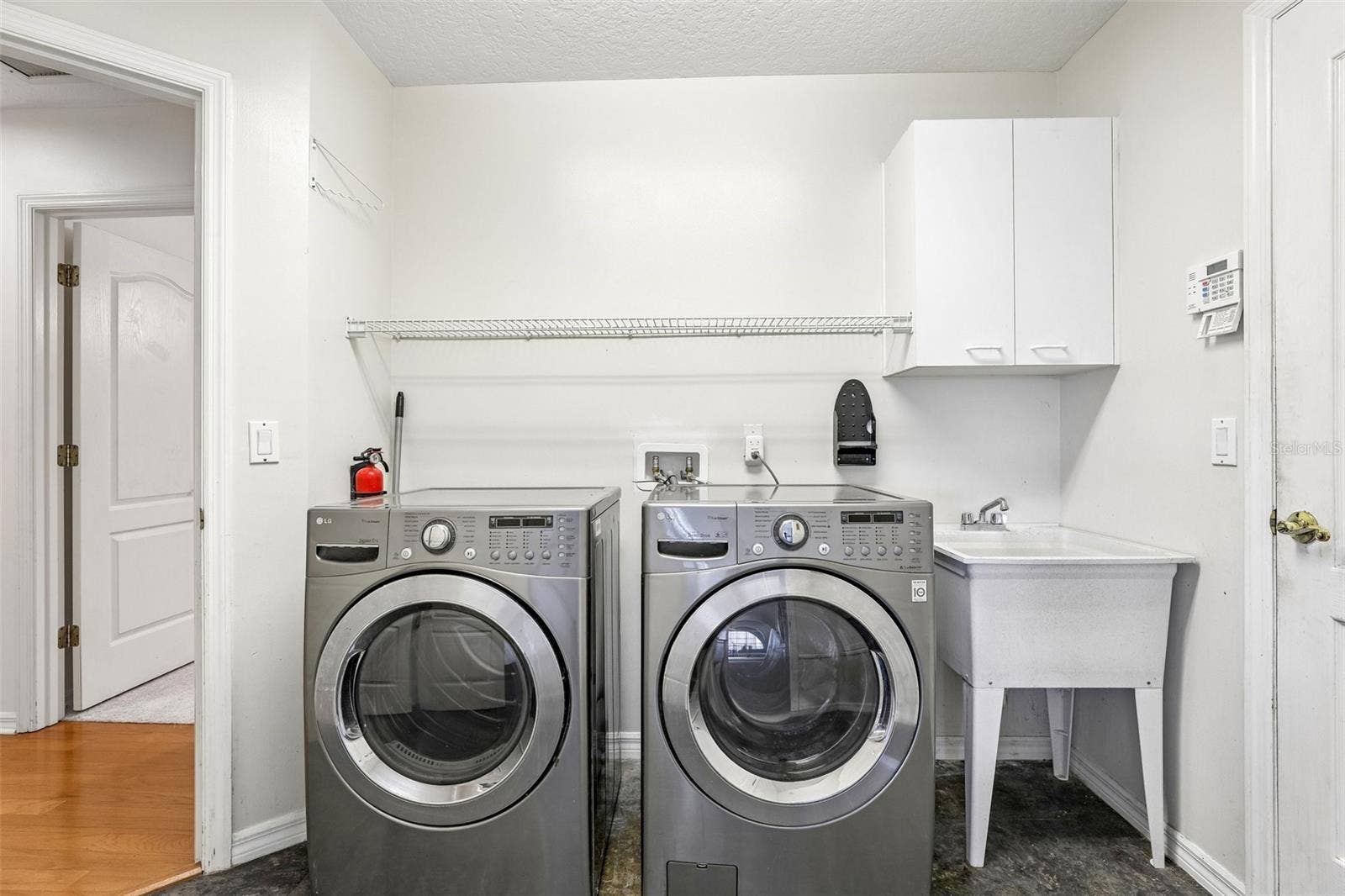 7891 BRIDGESTONE DRIVE, Orlando, FL 32835 Laundry Room