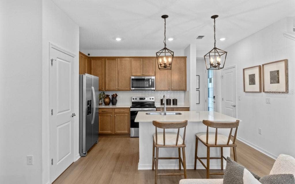 14078 WARD ROAD, Orlando, FL 32824 Model Home Design Only. Pictures and furnishings are for illustrative purposes only. Elevations, colors and options may vary. Furniture is for model home staging only.