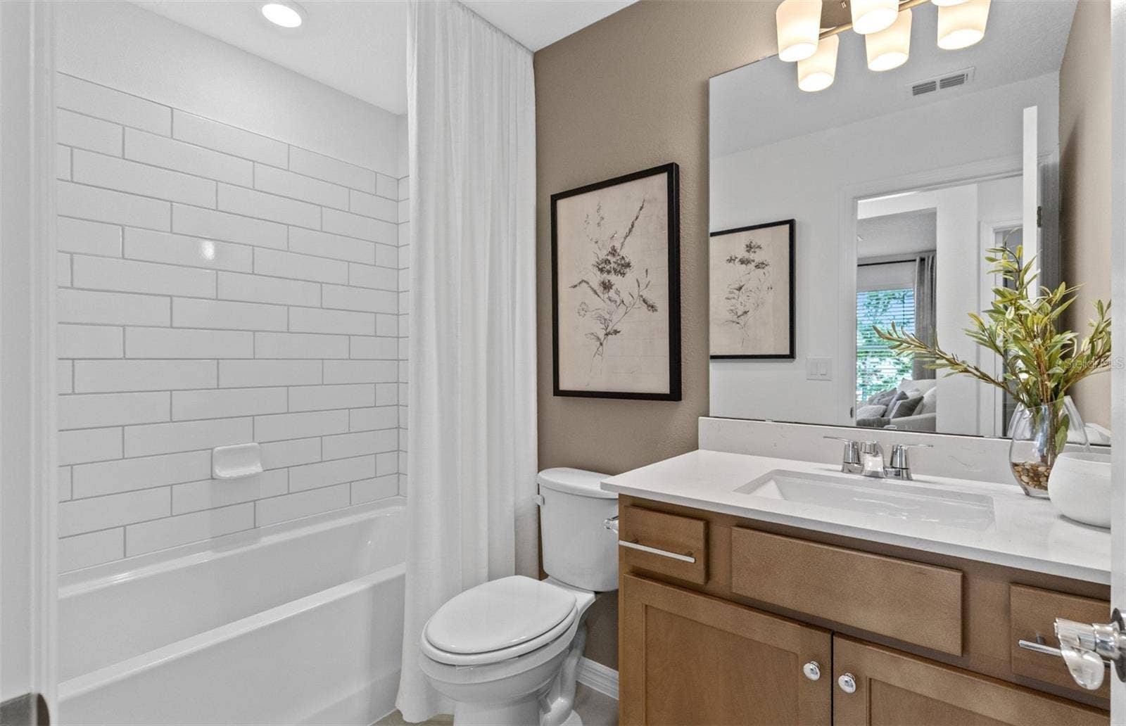 14078 WARD ROAD, Orlando, FL 32824 Model Home Design Only. Pictures and furnishings are for illustrative purposes only. Elevations, colors and options may vary. Furniture is for model home staging only.