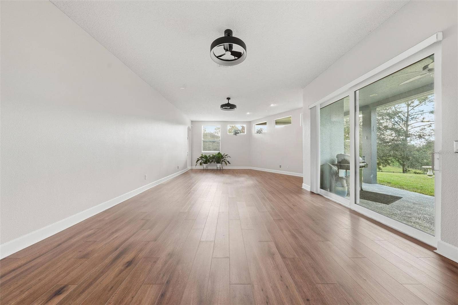 6234 TREMAYNE DRIVE, Mount Dora, FL 32757 Family Room 1
