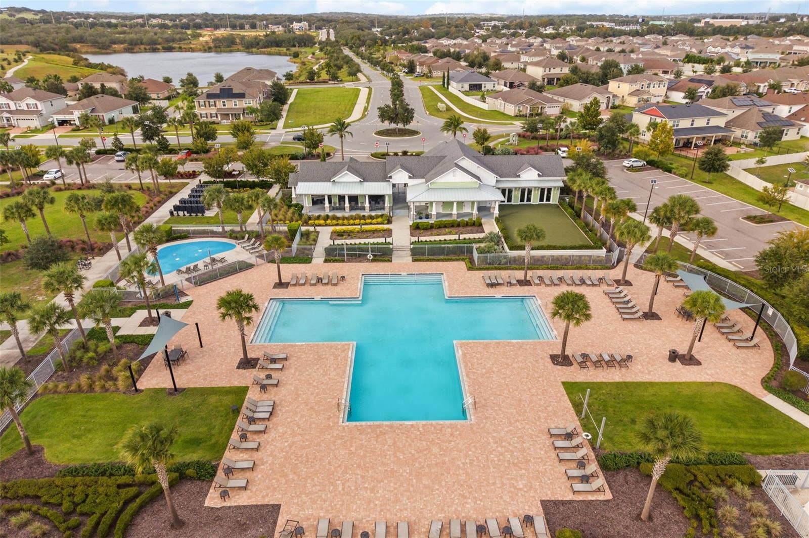 2013 VALENCIA BLOSSOM STREET, Clermont, FL 34711 Community pool, clubhouse, fitness center and lake