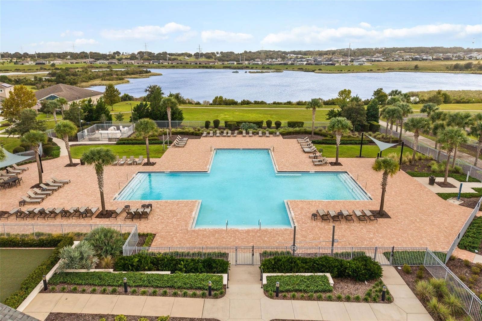2013 VALENCIA BLOSSOM STREET, Clermont, FL 34711 Community pool, clubhouse, fitness center and lake