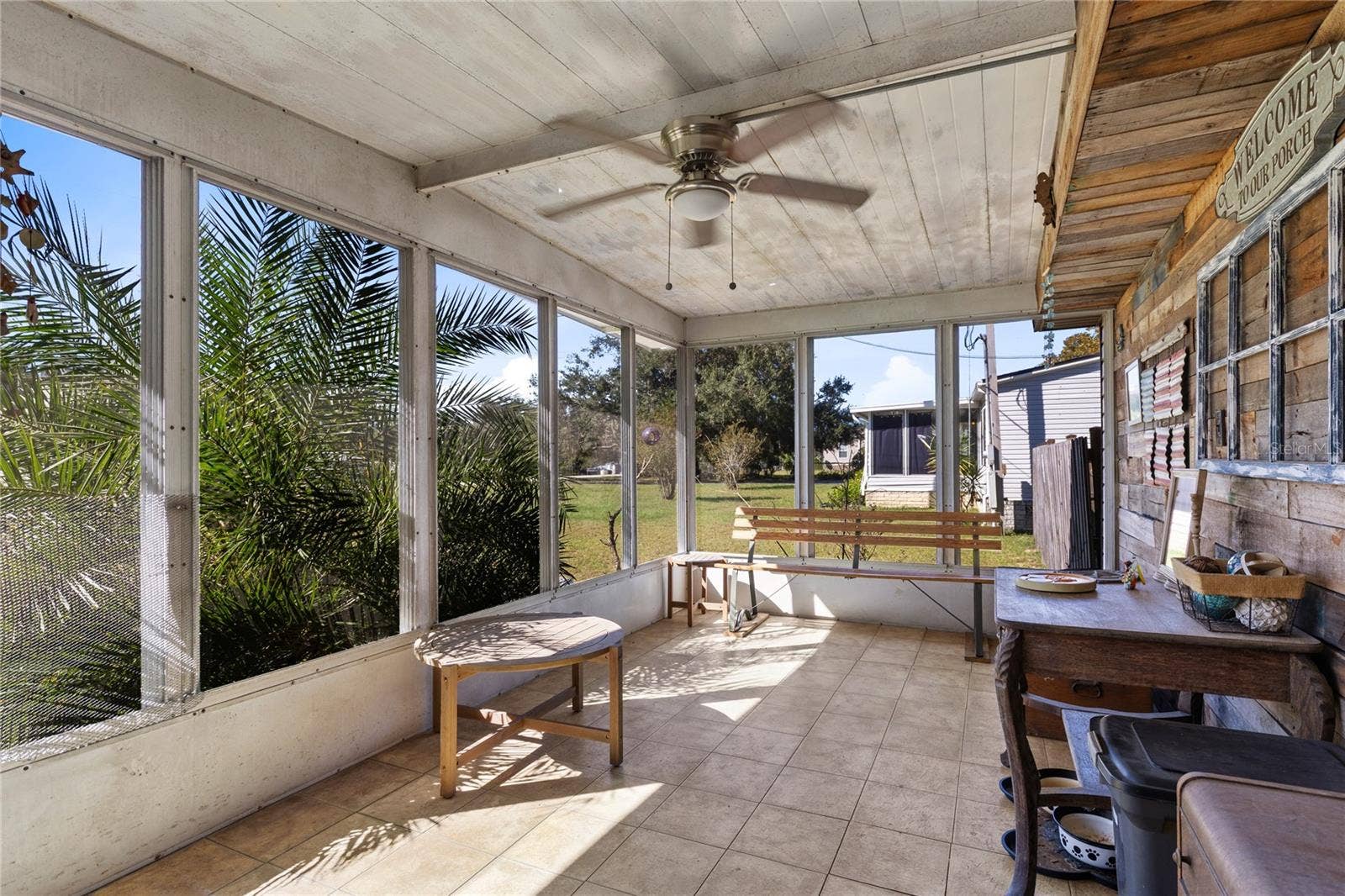 13419 MARYLAND AVENUE, Astatula, FL 34705 Front screened porch.
