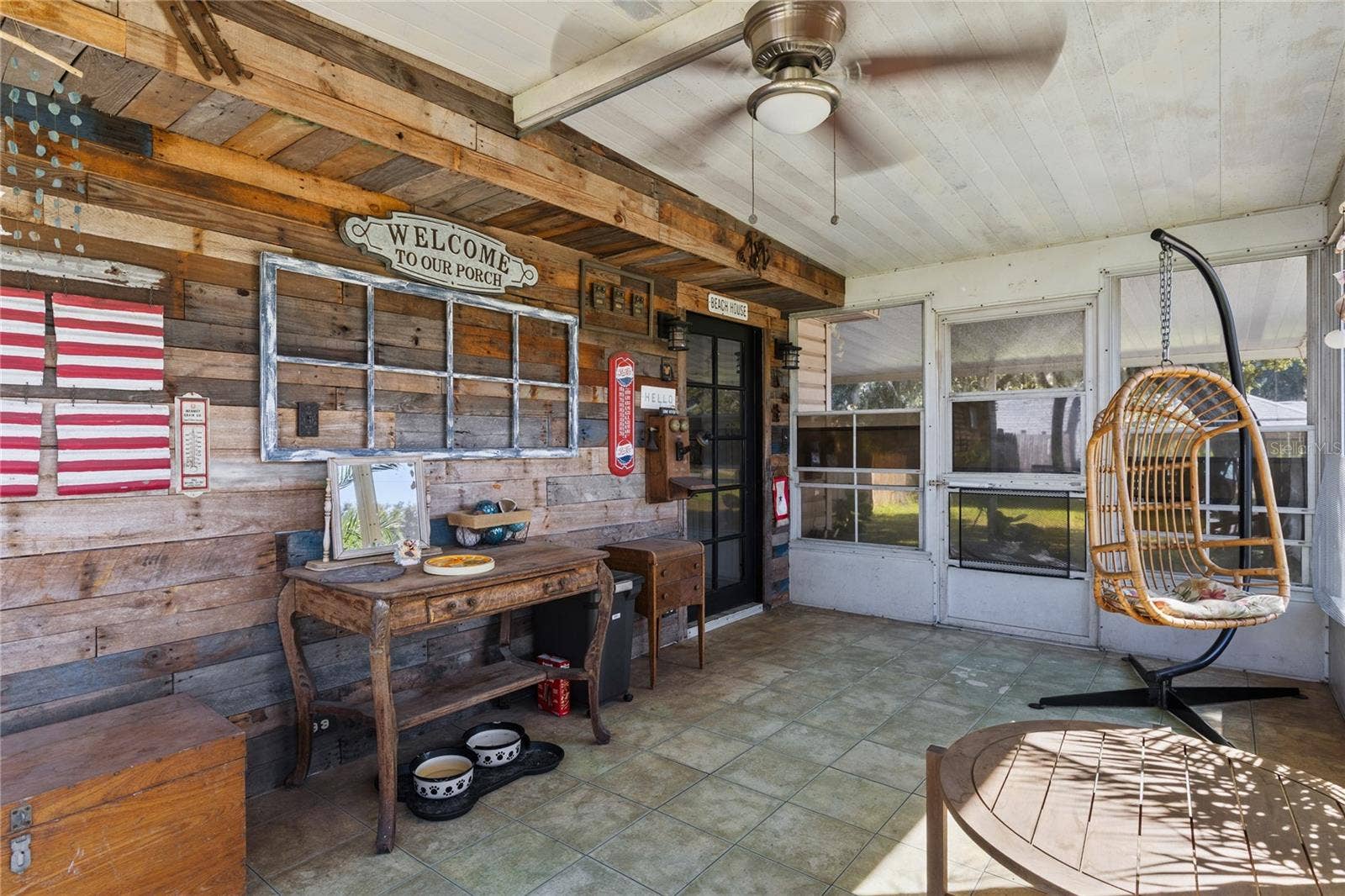 13419 MARYLAND AVENUE, Astatula, FL 34705 Front screened porch.