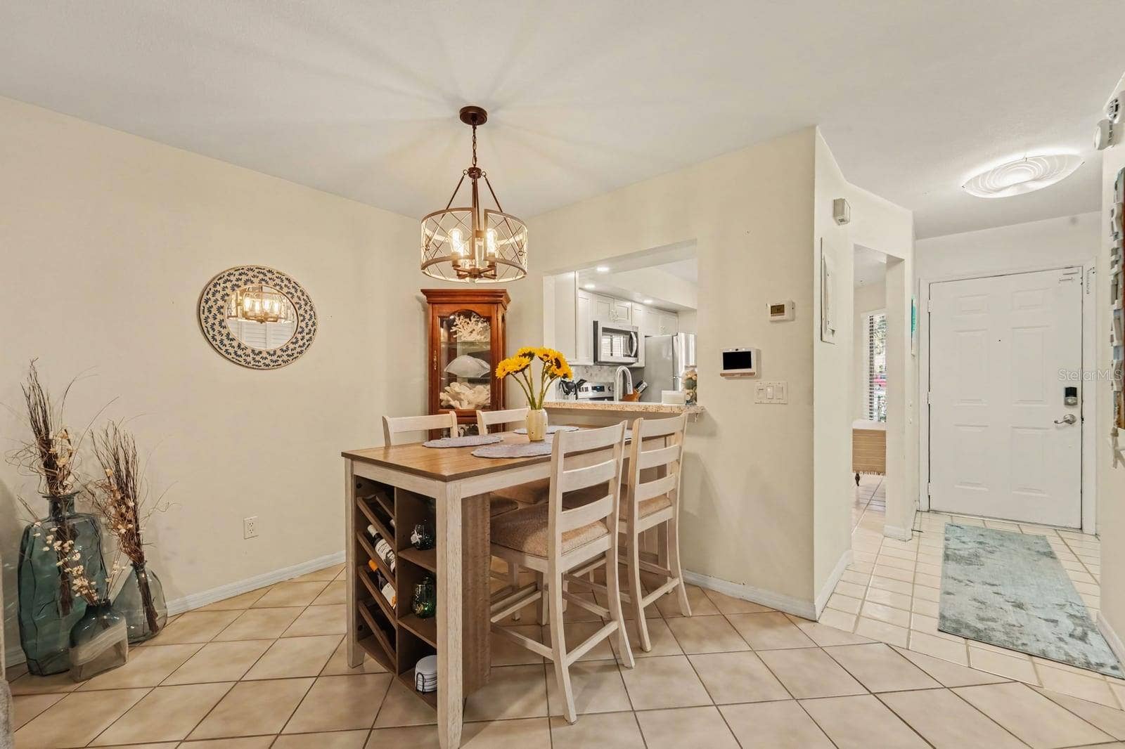 143 CROWN POINT CIRCLE, #143, Longwood, FL 32779 Open Dining Space Flows to Kitchen with Granite Counters