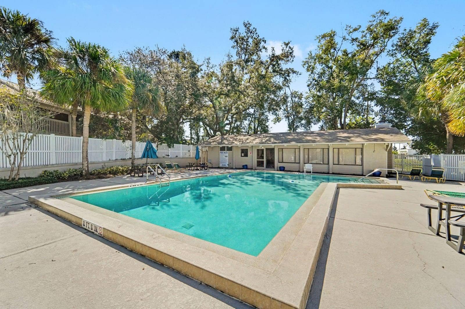143 CROWN POINT CIRCLE, #143, Longwood, FL 32779 Resort-Style Community Pool Surrounded by Mature Trees and Lounging Area