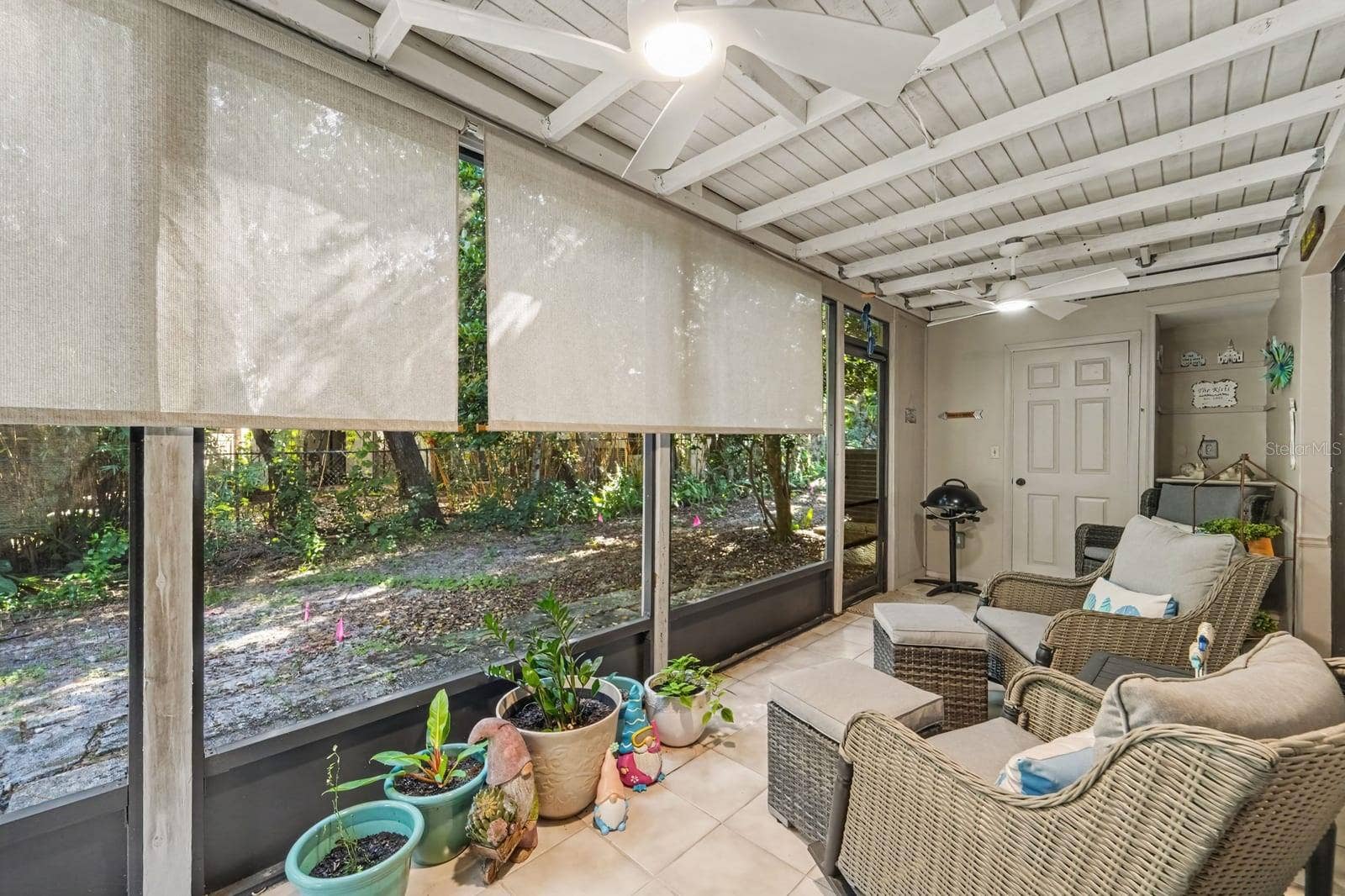 143 CROWN POINT CIRCLE, #143, Longwood, FL 32779 Extended Screened Room with Comfortable Seating and Sunlight
